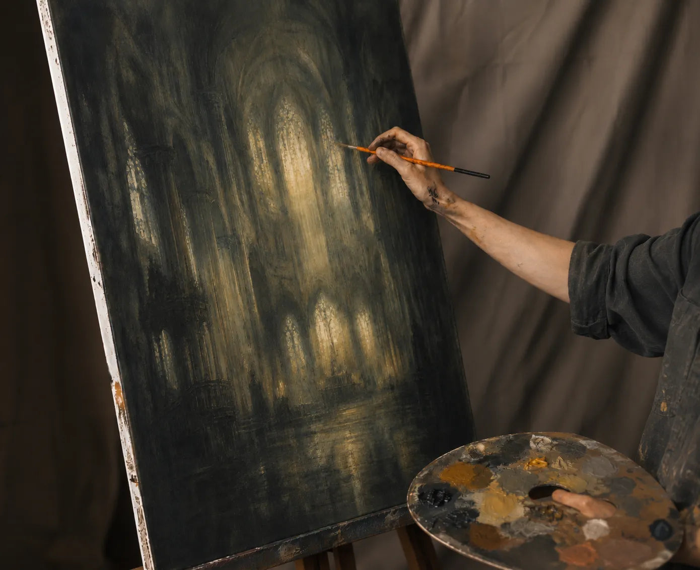 Artist painting on canvas